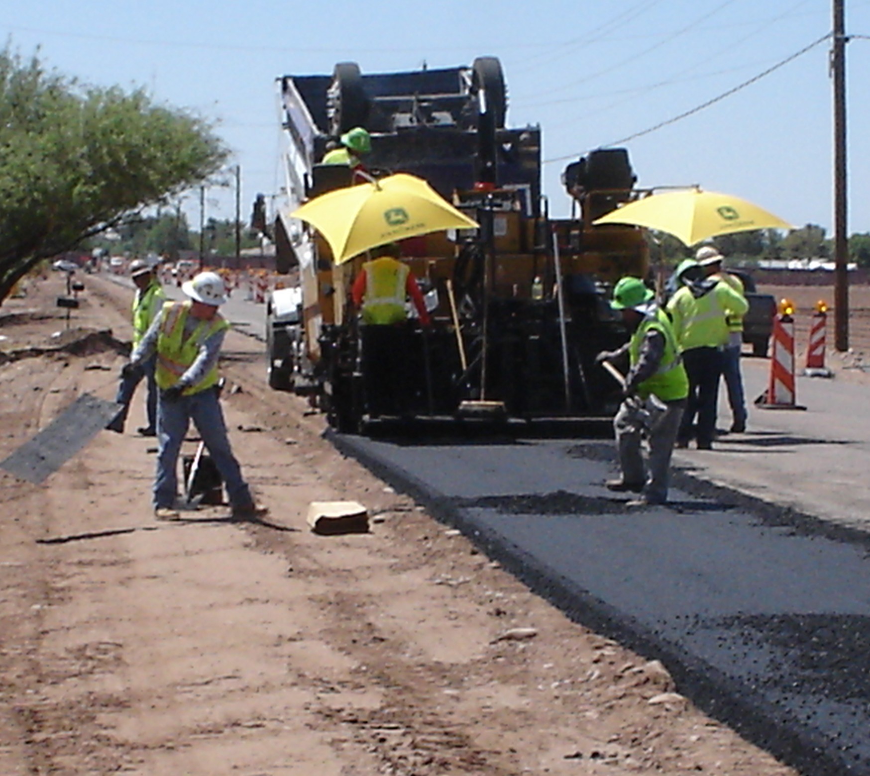 Contractor Mixing the Cement